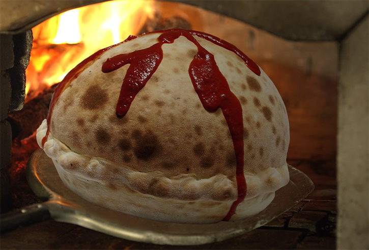 Volcano Pizza on Dining Table